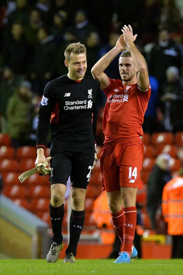 Simon Mignolet and Jordan Henderson