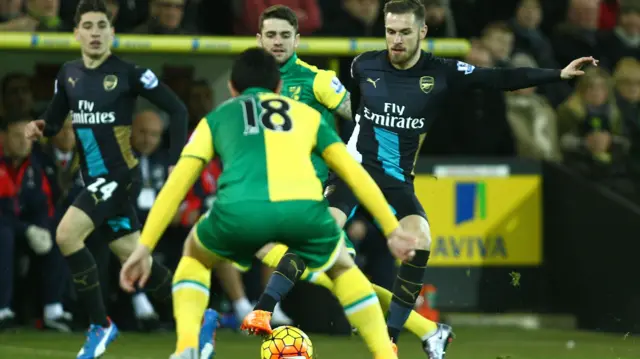 Arsenal's Aaron Ramsey runs with the ball