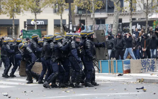 Riot police with shields