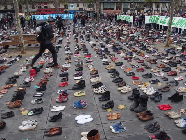 rows of shoes on the Place de la Republique