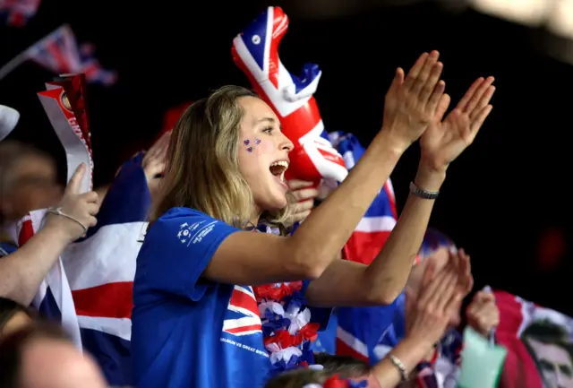 A GB supporter applauds Andy Murray