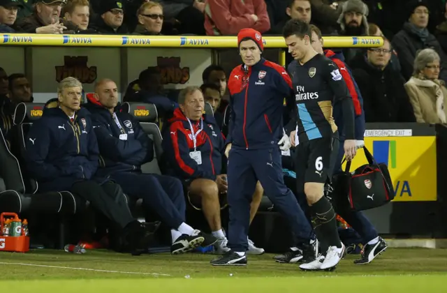 Arsenal's Laurent Koscielny goes off injured