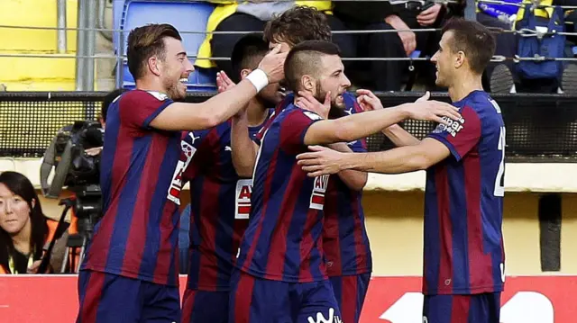 Eibar players celebrate a goal against Villareal