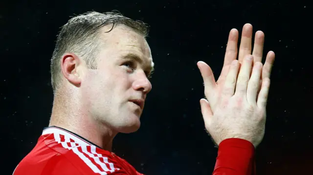 Wayne Rooney applauds