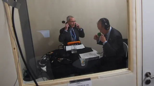 Jim Yong Kim in a makeshift radio studio