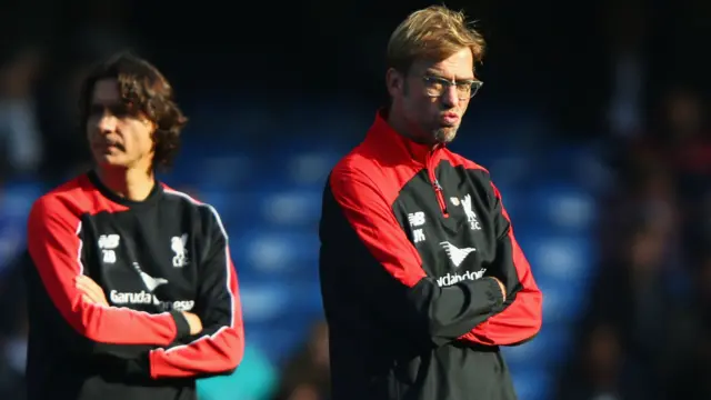 Liverpool manager Jurgen Klopp (right)