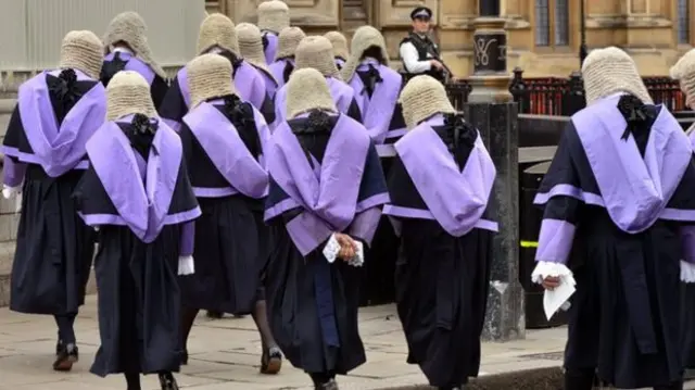 Judges in wigs and robes