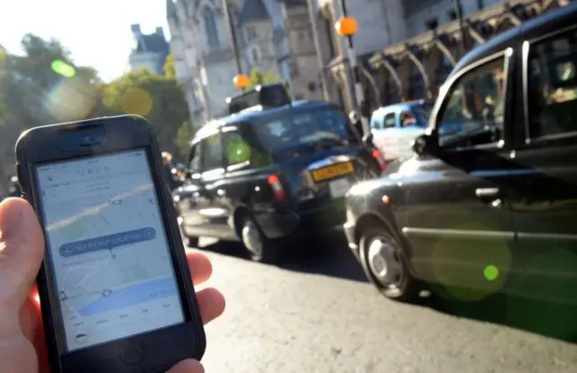 Uber app and black cab