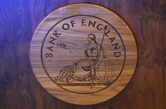 Bank of England wood carving on BofE desk