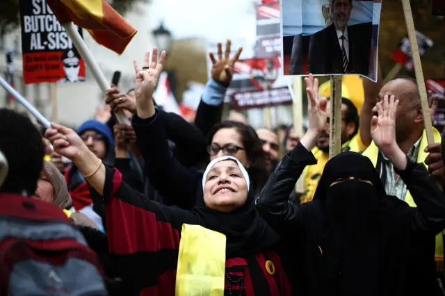 Protesters demonstrate against the Egyptian president's visit in central London