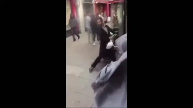 Kashif Samuels throws a walking frame off a bus in Tottenham