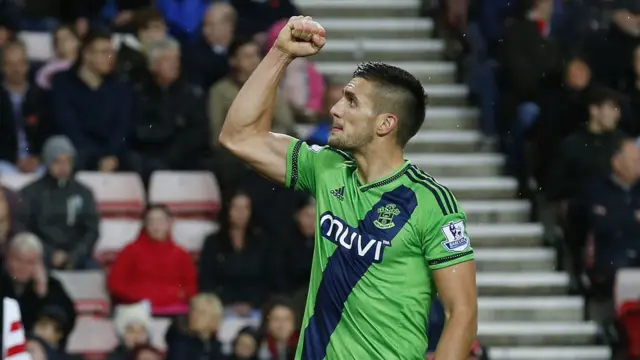 Dusan Tadic celebrates