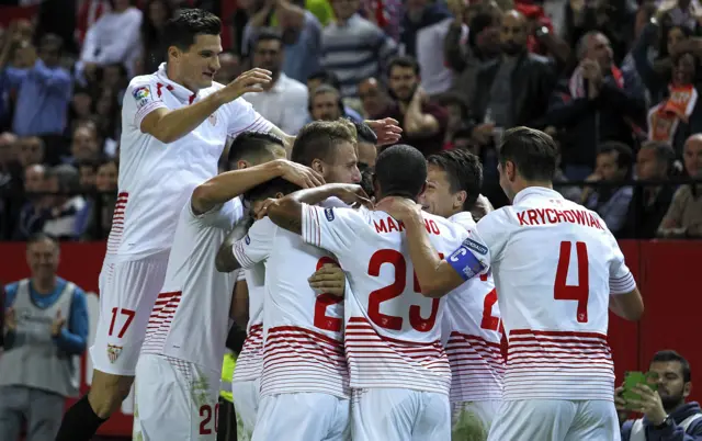 Sevilla FC players celebrate