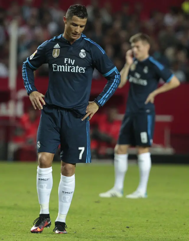 Cristiano Ronaldo looks down