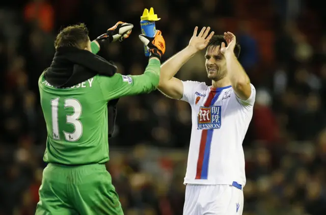 Crystal Palace's Wayne Hennessey celebrates winning with Scott Dann