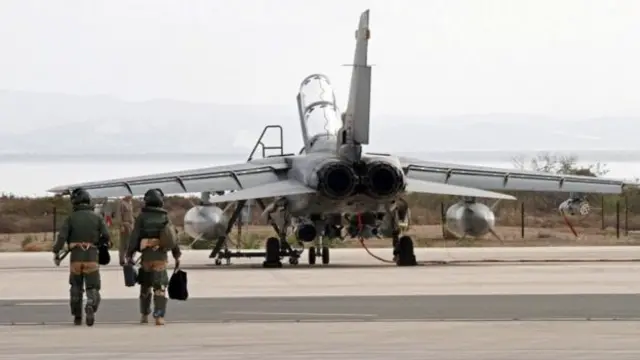 UK troops and a plane