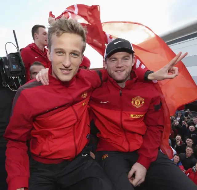 Anders Lindegaard and Wayne Rooney