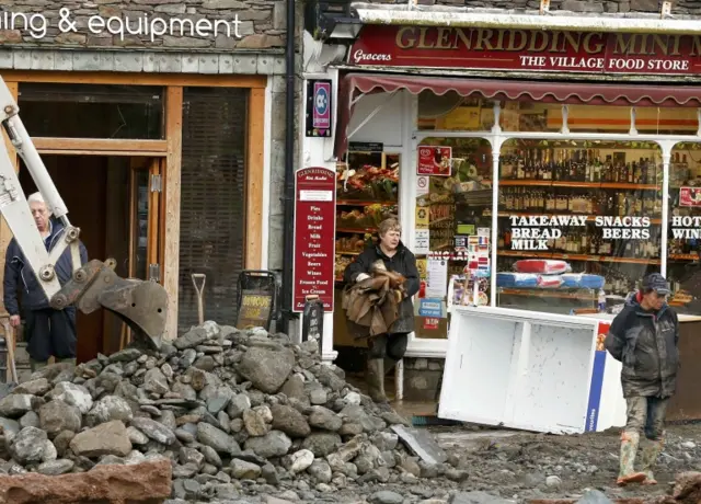 People cleaning up in Glenridding