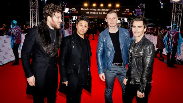 Stereophonics pose on the red carpet earlier in the evening