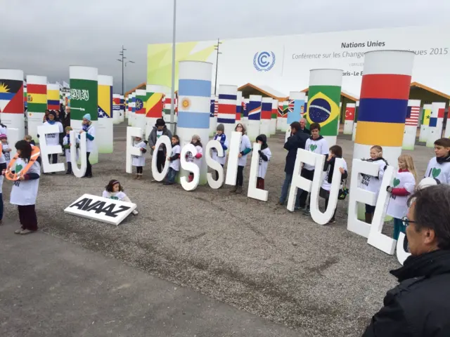 children holding letters