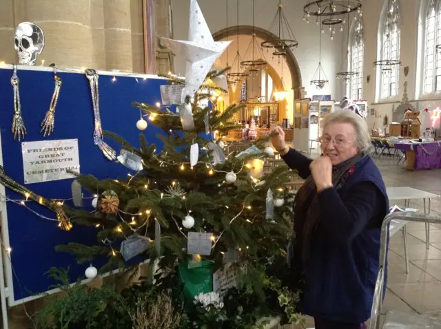 The Christmas tree, showing decorations and volunteer