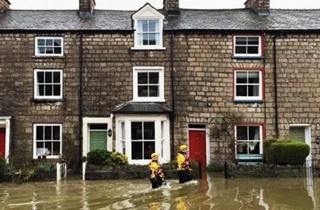 Mountain rescue volunteers in water