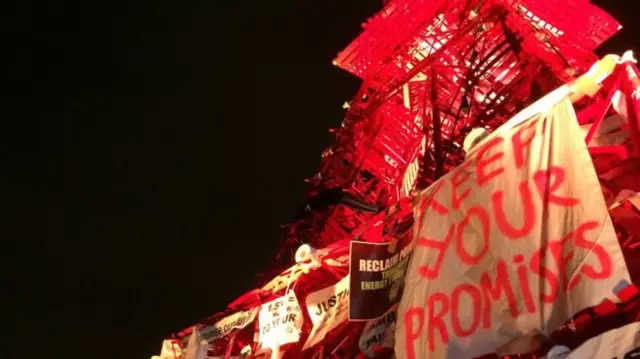 Signs at climate rally