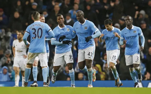 Manchester City players celebrate