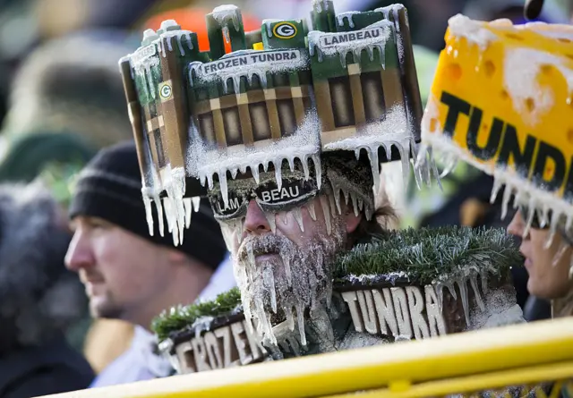 NFL fan with Frozen Tundra hat