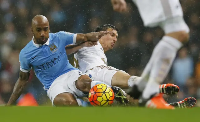 Fabian Delph and Jack Cork compete for the ball