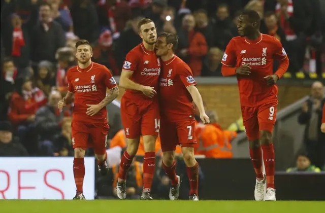 Jordan Henderson celebrates scoring against West Brom