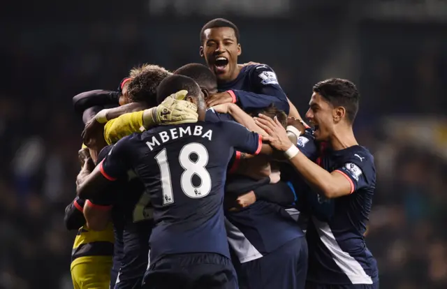 Newcastle players react to scoring a late winner