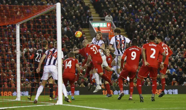 Jonas Olsson puts West Brom ahead at Anfield