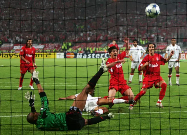 Liverpool's Xabi Alonso scores