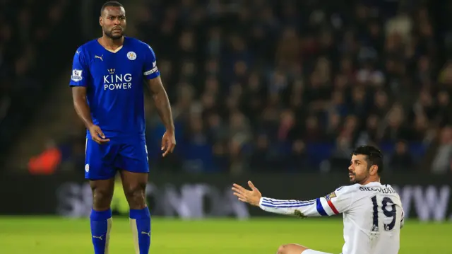 Diego Costa sits on the ground