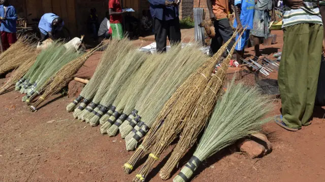 A broom vendor in the market of Bambari, in Central African Republic