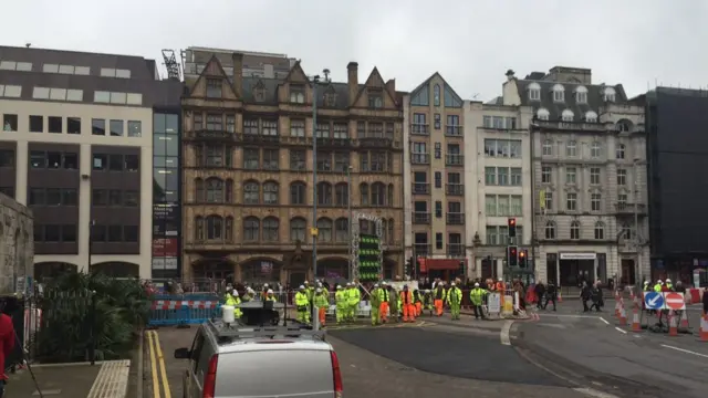 Crowd looks on ready to see the demolition of Birmingham Central Librarty