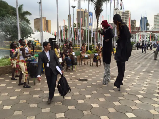 Stilt walkers at WTO summit