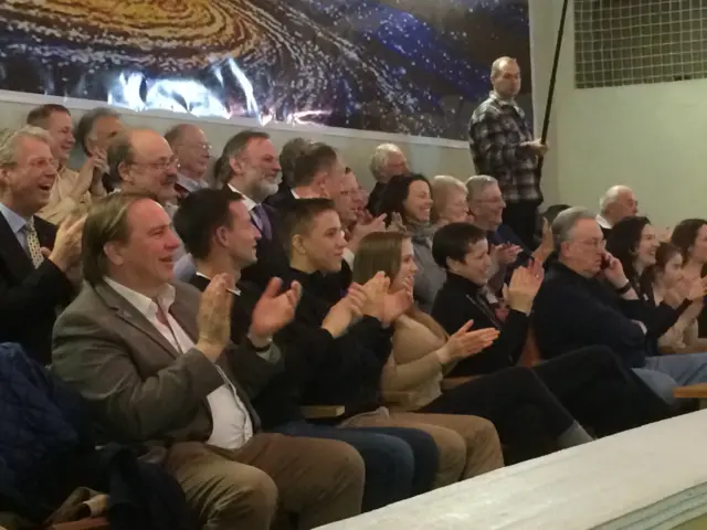 Family and friends in Baikonur applaud