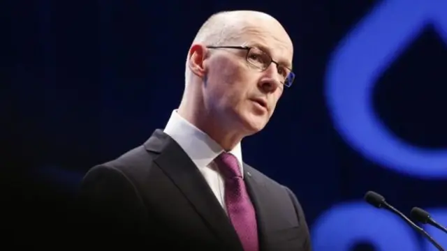 Finance Secretary John Swinney will deliver his draft budget this afternoon