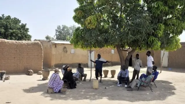 People under a tree in Mali