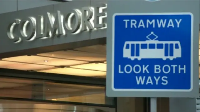 Tramway - look both ways signpost