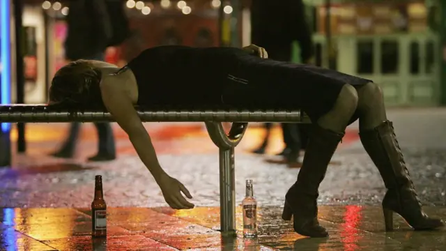 Drunk woman on a bench