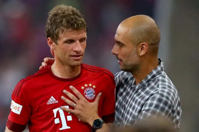 Pep Guardiola and Thomas Muller