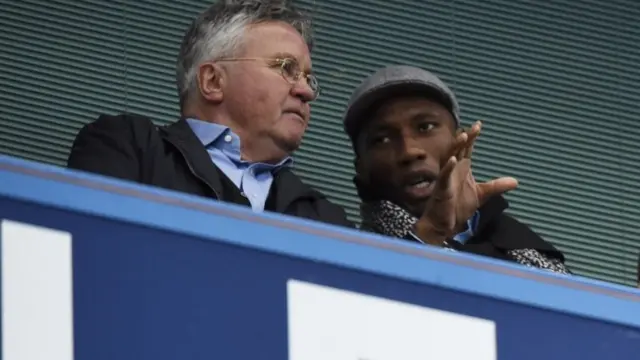 Guus Hiddink sat in the stands with Didier Drogba