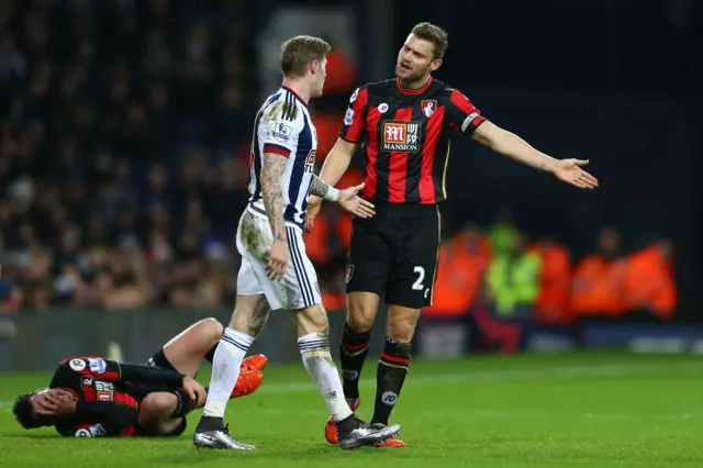 Simon Francis argues with James McClean