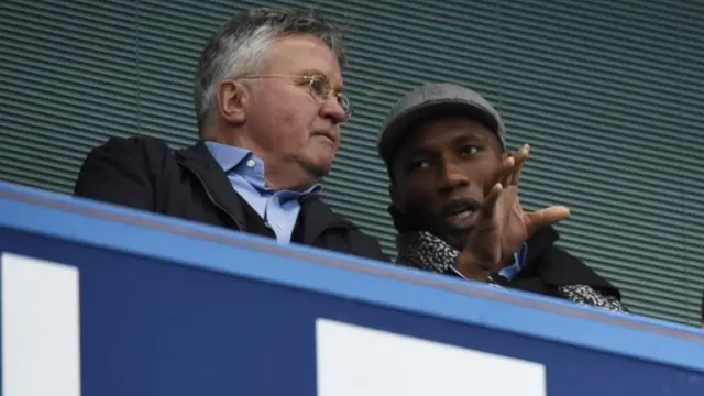 Guus Hiddink sat in the stands with Didier Drogba