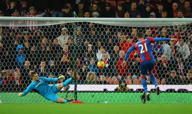 Connor Wickham scores from the penalty spot for Crystal Palace