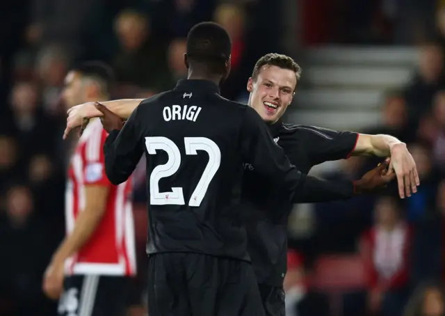 Divock Origi and Brad Smith