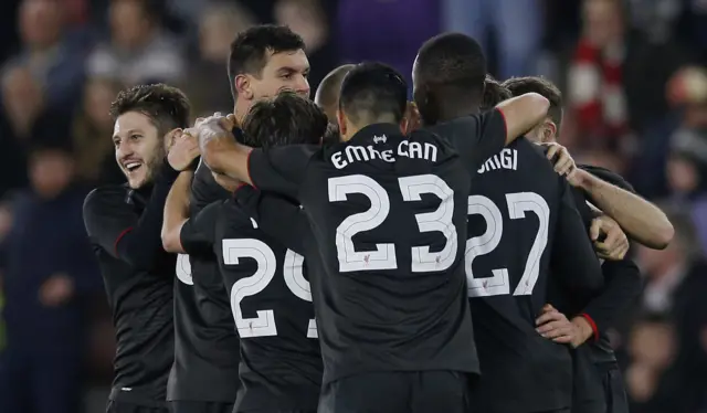 Liverpool celebrate their third goal against Southampton